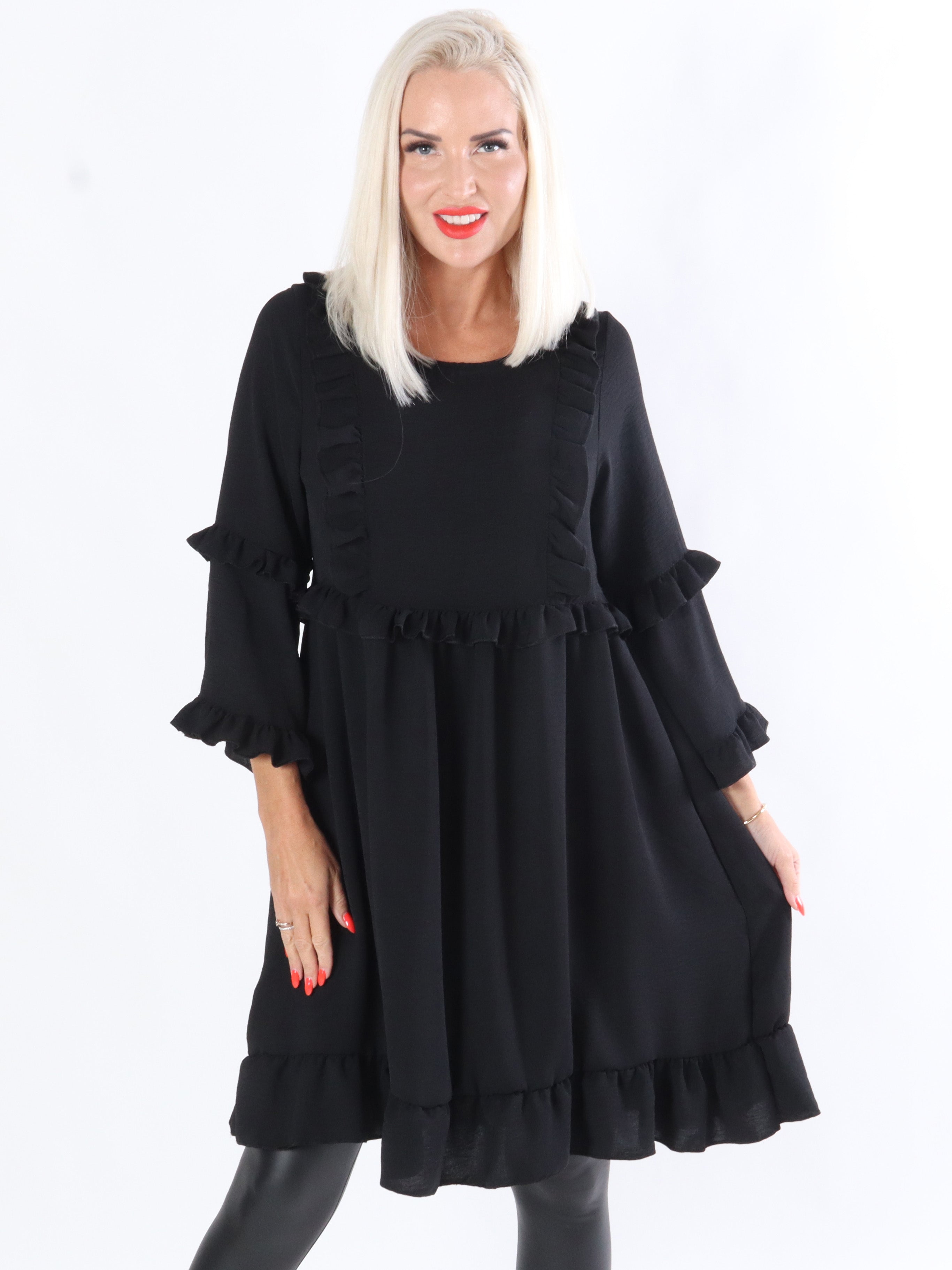 Thyra - Klänning med volangkanter framtill